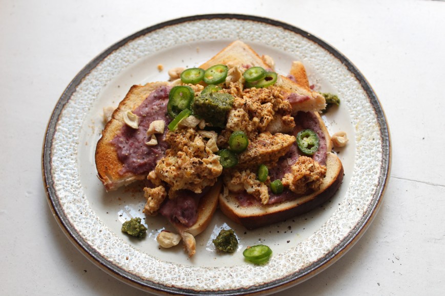 Spicy Scrambled Egg on White Bread Toast with Red Kidney Bean Hummus.