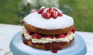 Gluten Free Sponge Cake with strawberry jam, fresh cream and chopped fresh strawberries