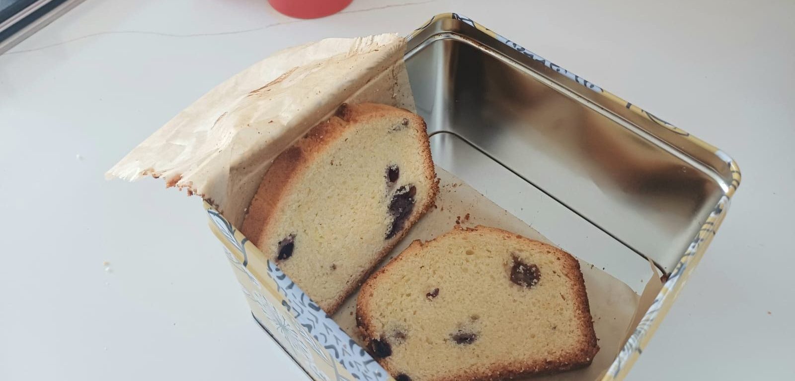 Slices of blueberry cake in a cake tin